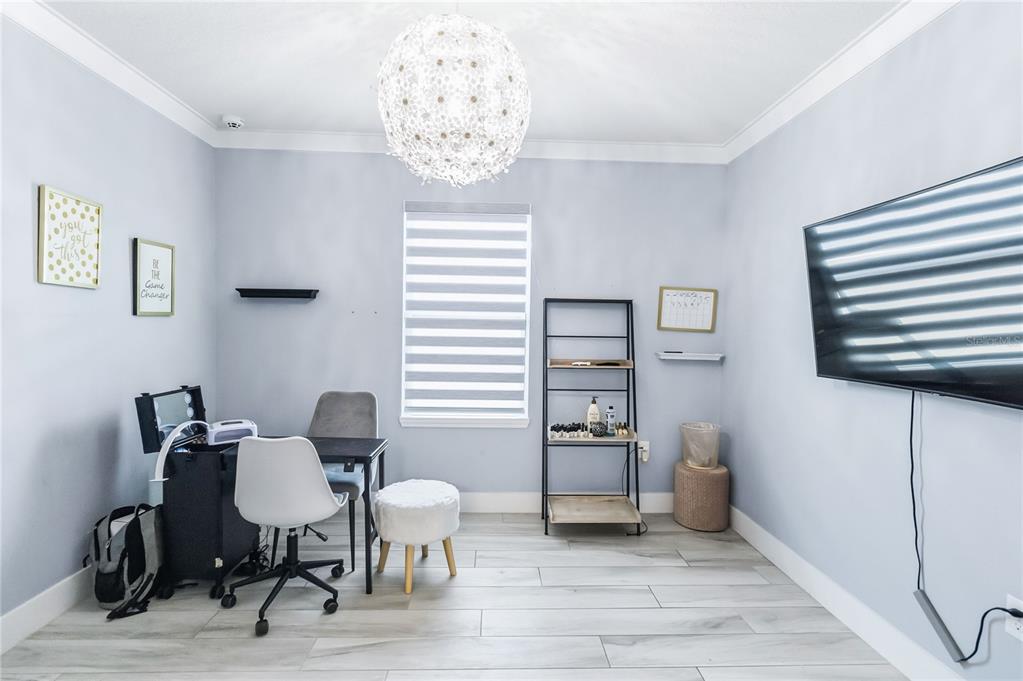 1759 Copinger Terrace Kissimmee, FL 34744 - Photo 21 of 29 a view of a workspace with furniture and a window