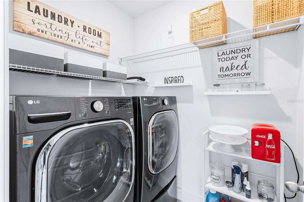 1759 Copinger Terrace Kissimmee, FL 34744 - Photo 23 of 29 a utility room with dryer and washer