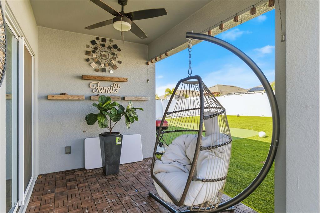 1759 Copinger Terrace Kissimmee, FL 34744 - Photo 24 of 29 a view of a staircase with a potted plant and a rug