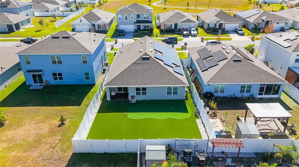 1759 Copinger Terrace Kissimmee, FL 34744 - Photo 29 of 29 a front view of house with yard and swimming pool