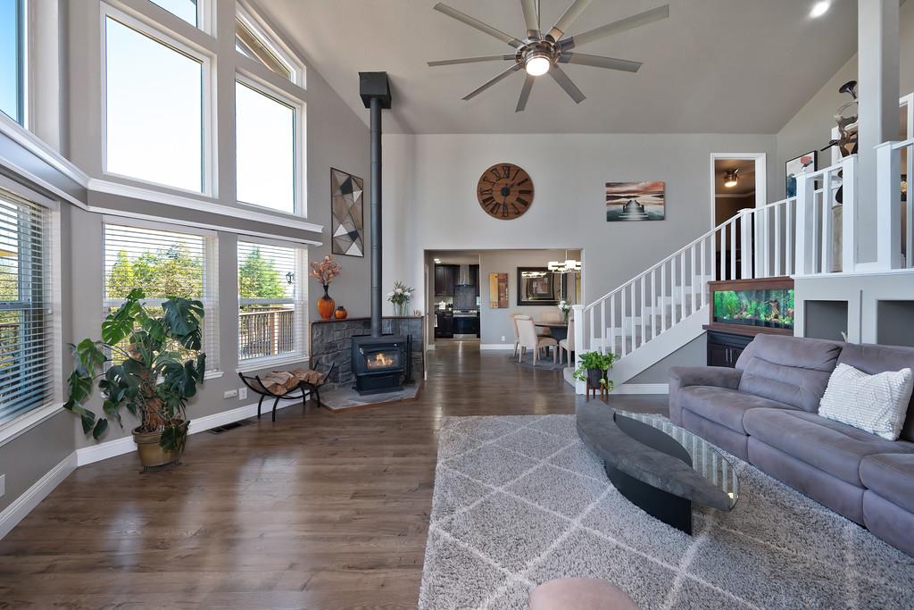 2378 Cascade Trail Cool, CA 95614 - Photo 11 of 57 a living room with patio furniture and a large window