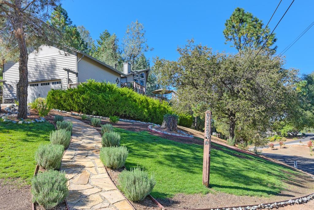 2378 Cascade Trail Cool, CA 95614 - Photo 2 of 57 a view of a pathway with a yard