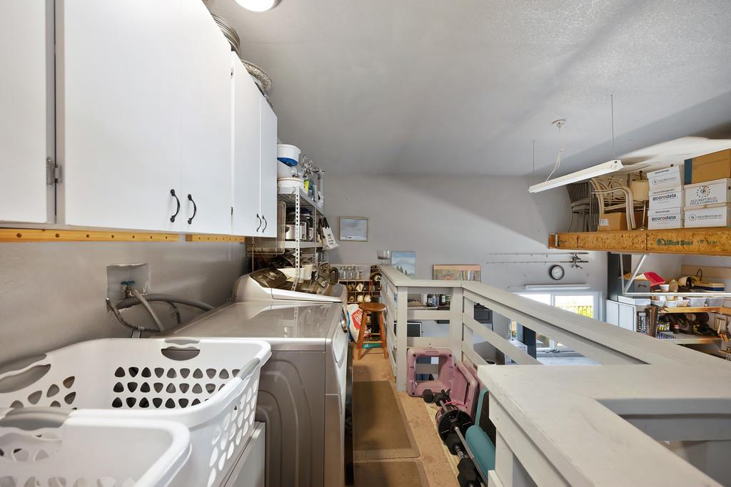 2378 Cascade Trail Cool, CA 95614 - Photo 36 of 57 a utility room with multiple dryer and washer
