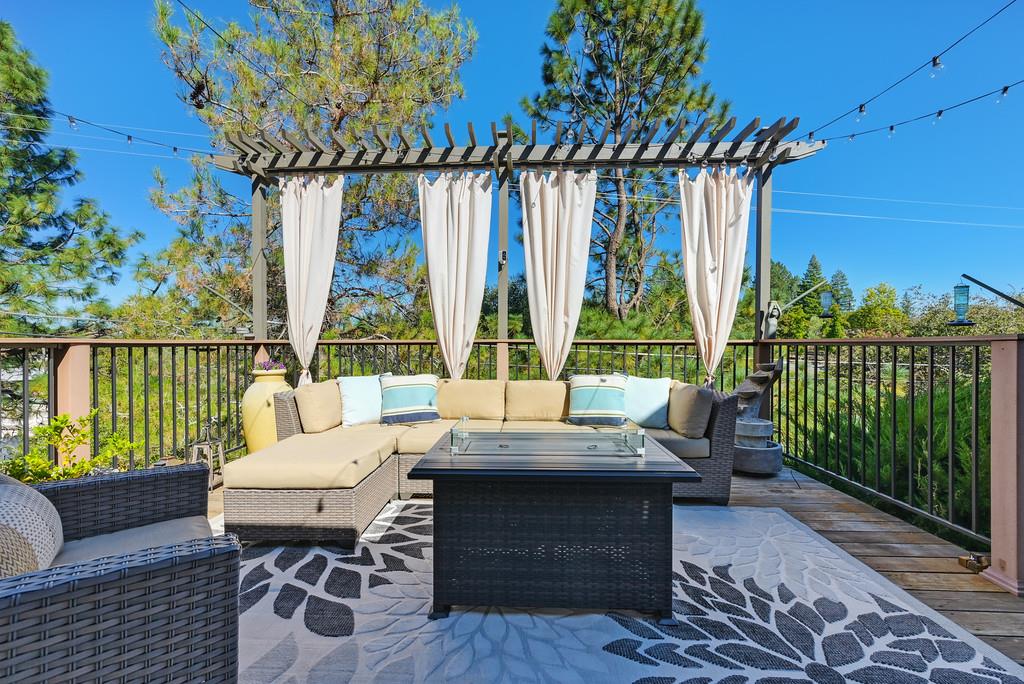 2378 Cascade Trail Cool, CA 95614 - Photo 42 of 57 a view of a patio with a table chairs and a table