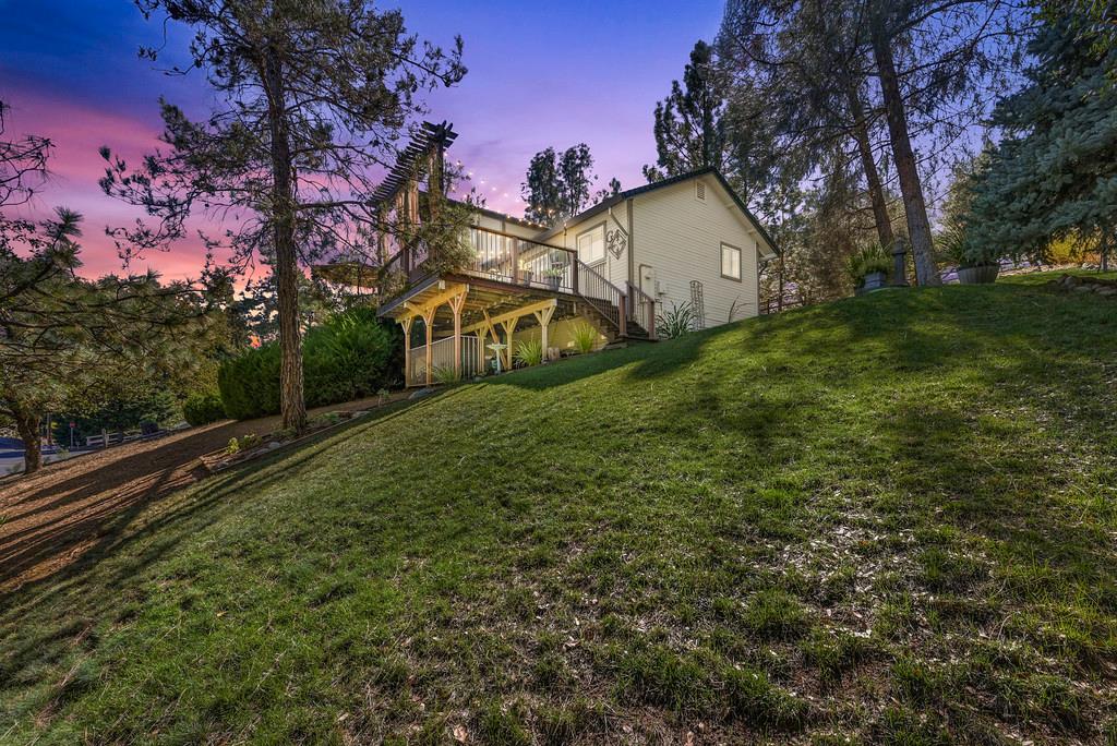 2378 Cascade Trail Cool, CA 95614 - Photo 45 of 57 a view of a house with a yard