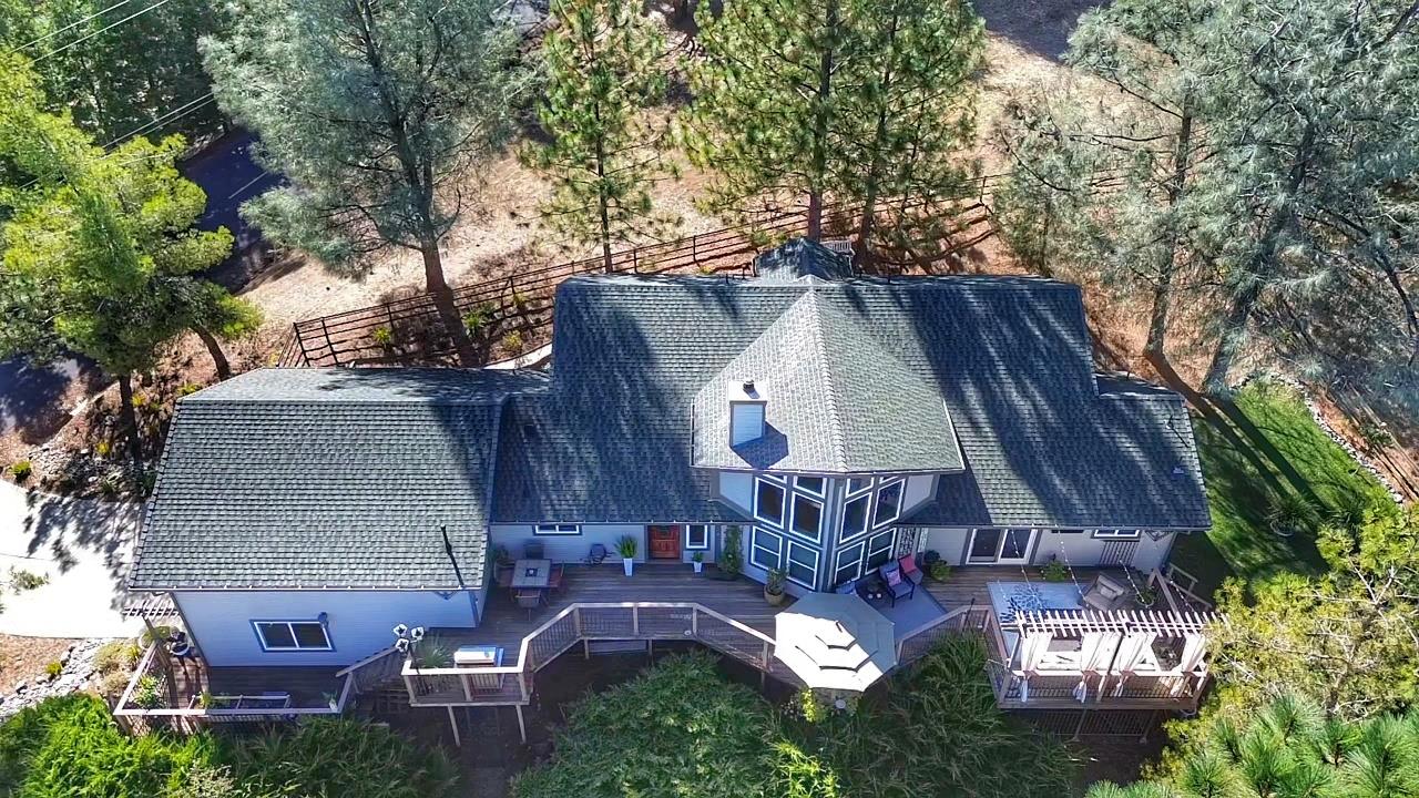 2378 Cascade Trail Cool, CA 95614 - Photo 51 of 57 an aerial view of a house with outdoor space and trees
