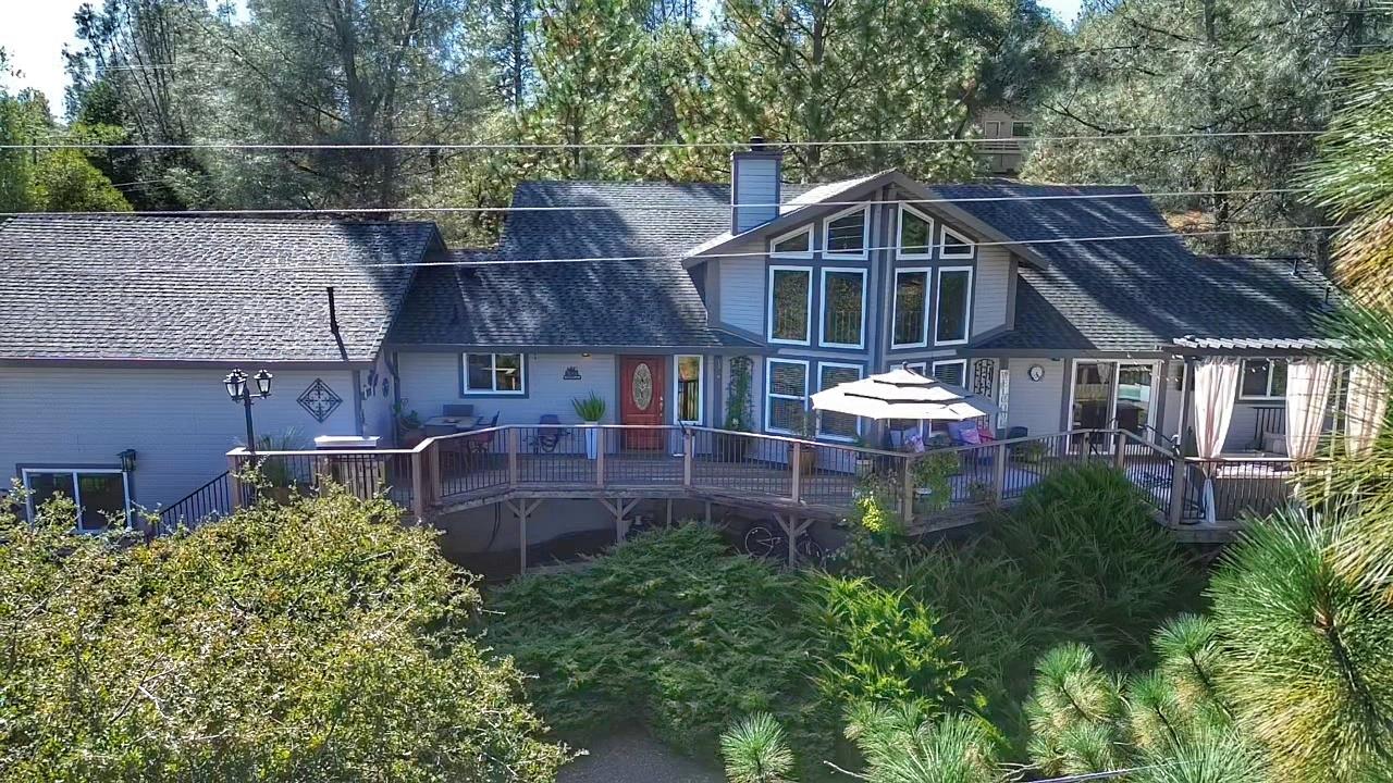 2378 Cascade Trail Cool, CA 95614 - Photo 52 of 57 a view of house with yard and outdoor seating