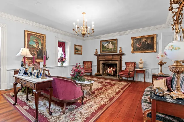 a living room with furniture and a rug