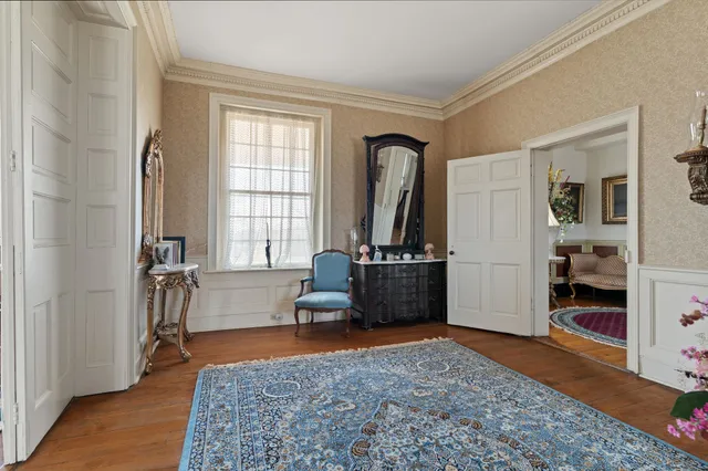 a view of a building next to a big yard