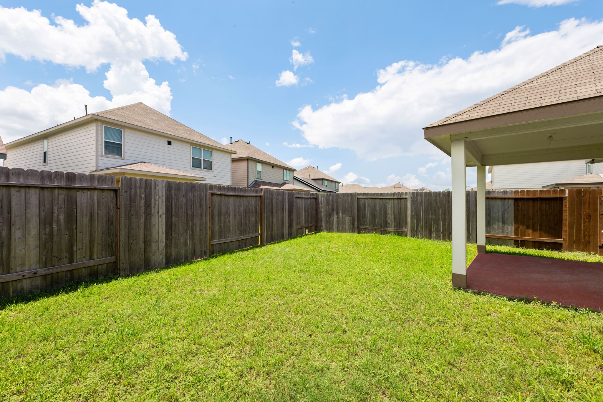 17555 Greystanes Road Humble, TX 77346 - Photo 26 of 28 a view of a backyard of the house