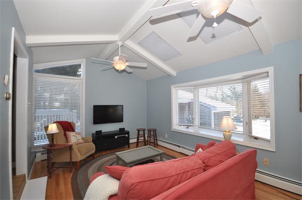 81 Rumstick Road Barrington, RI 02806 - Photo 8 of 16 a living room with furniture and a flat screen tv
