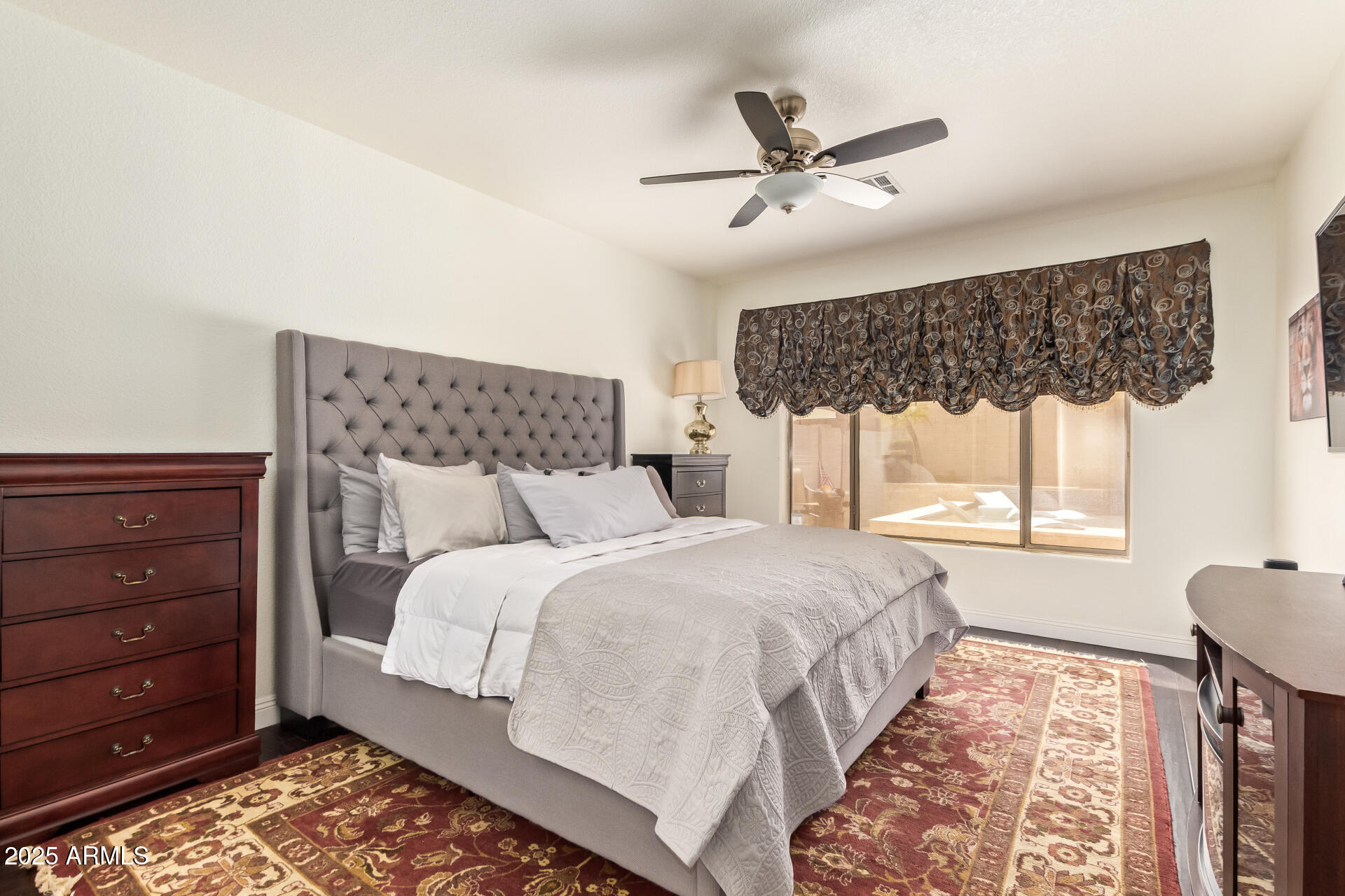 19606 North 23rd Way Phoenix, AZ 85024 - Photo 21 of 41 a bedroom with a bed and a window