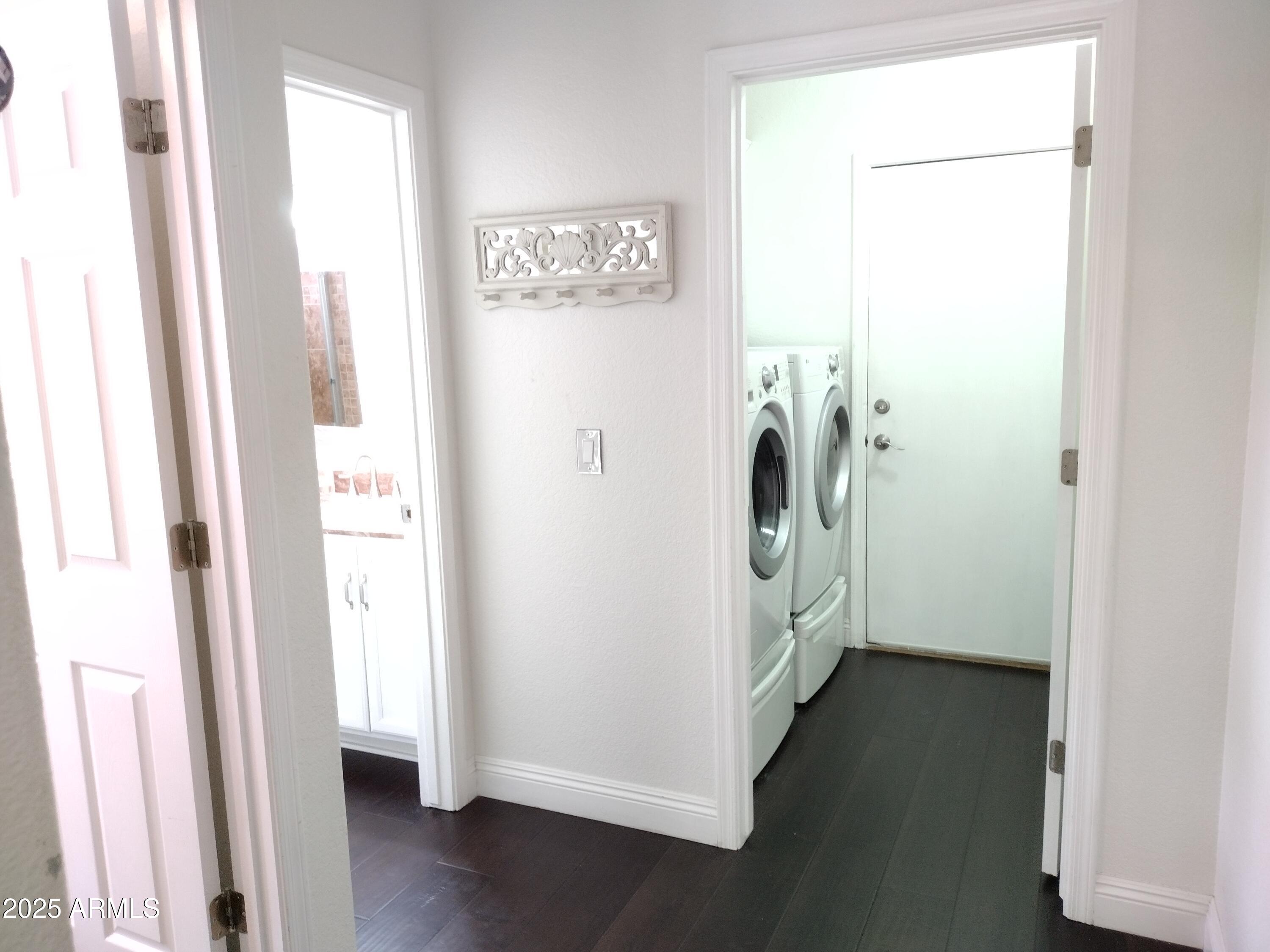 19606 North 23rd Way Phoenix, AZ 85024 - Photo 27 of 41 a view of a hallway with wooden floor