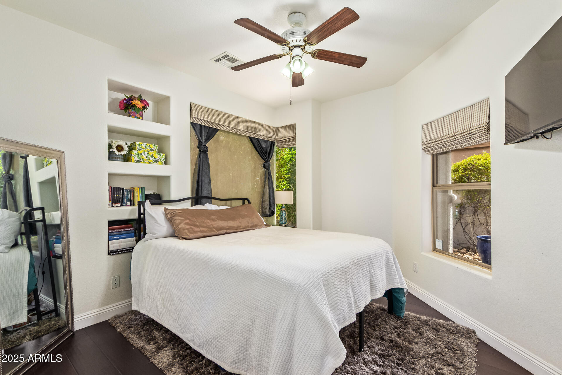 19606 North 23rd Way Phoenix, AZ 85024 - Photo 31 of 41 a bedroom with a bed and a window