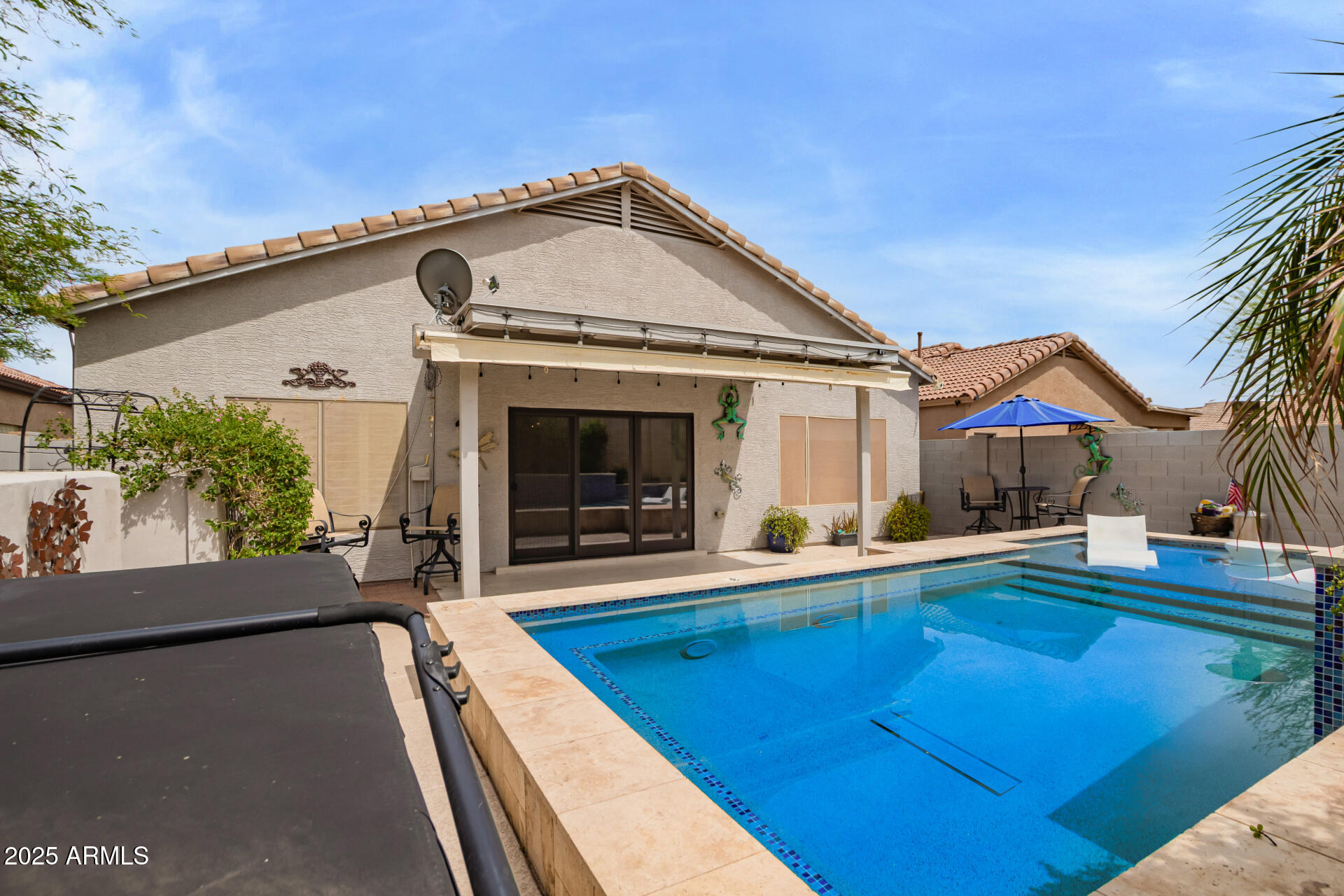 19606 North 23rd Way Phoenix, AZ 85024 - Photo 38 of 41 a view of a house with pool and chairs