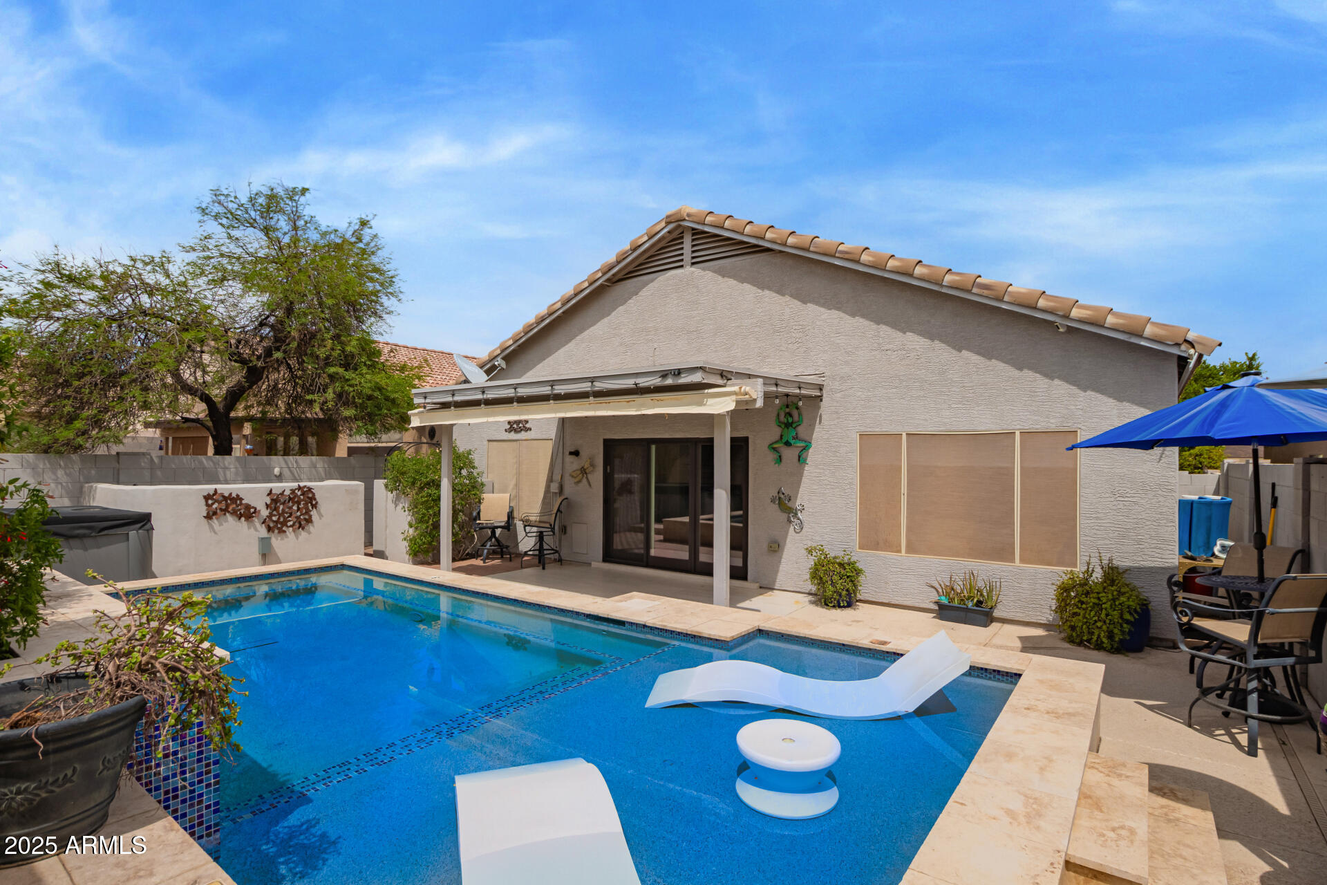 19606 North 23rd Way Phoenix, AZ 85024 - Photo 39 of 41 a view of a house with pool and chairs