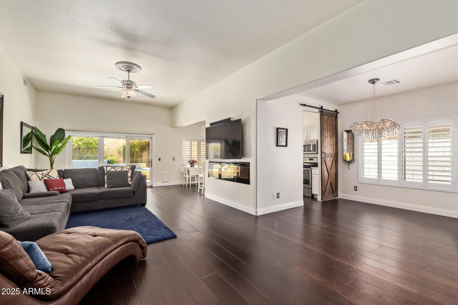19606 North 23rd Way Phoenix, AZ 85024 - Photo 6 of 41 a living room with furniture and a large window