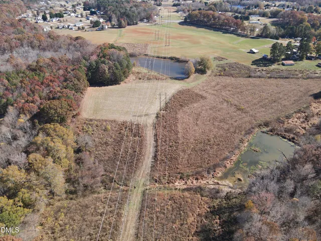 a view of lot of snow on the side of the road