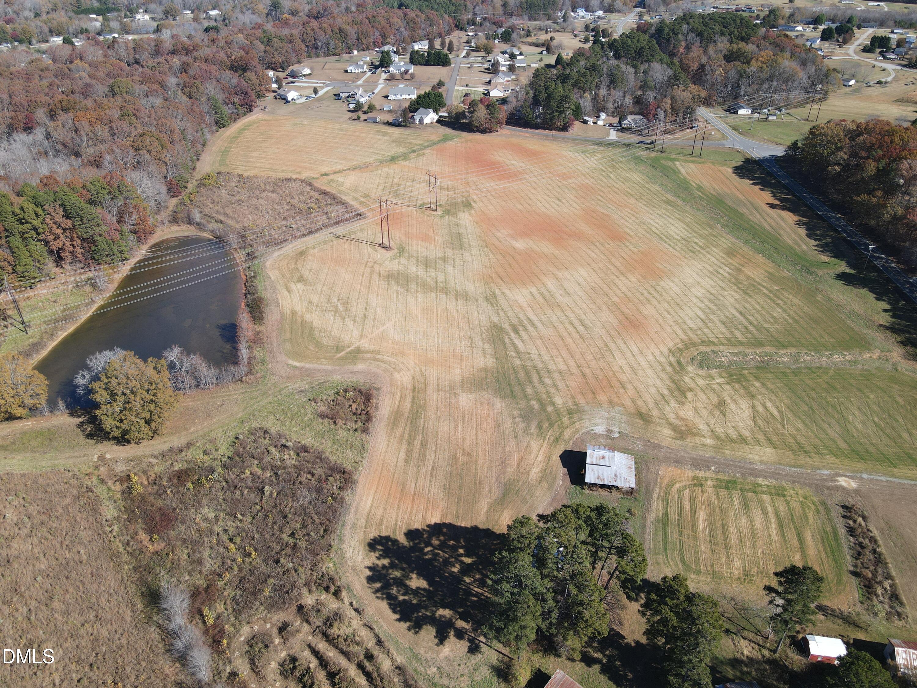 0 Antioch Church Road Roxboro, NC 27574 - Photo 16 of 61 a view of a backyard of a house