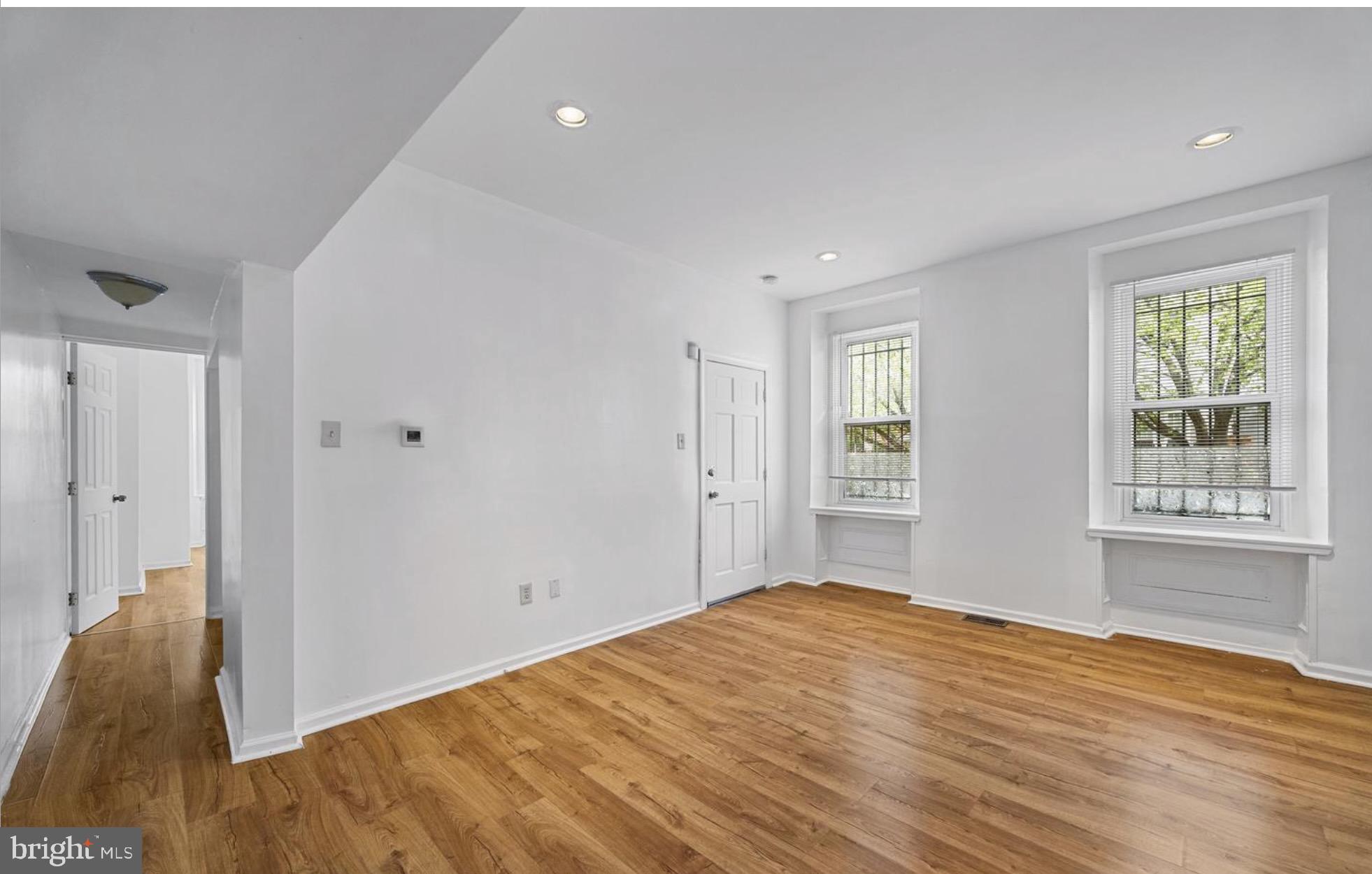 3800 Spring Garden Street, Unit 1 Philadelphia, PA 19104 - Photo 9 of 10 a bedroom with a bed and a window