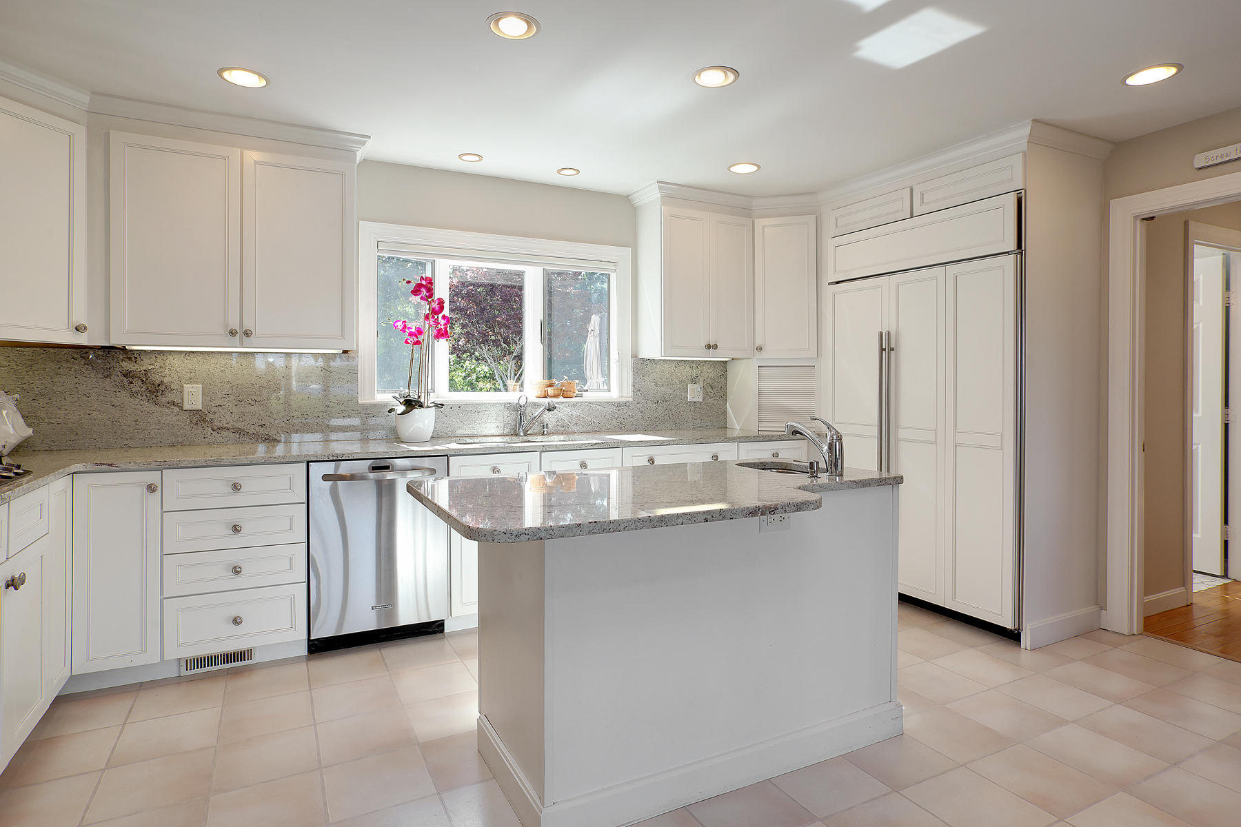 289 East Bay Road Osterville, MA 02655 - Photo 14 of 30 a kitchen with stainless steel appliances granite countertop a sink and dishwasher a refrigerator with white cabinets