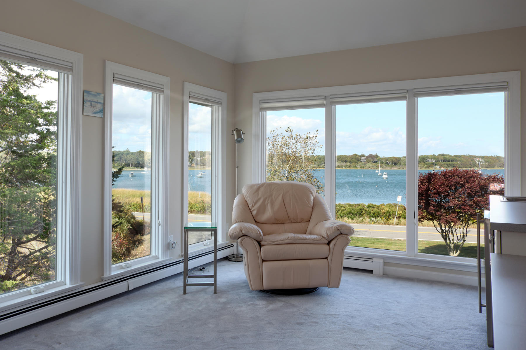 289 East Bay Road Osterville, MA 02655 - Photo 20 of 30 a living room with furniture and floor to ceiling windows