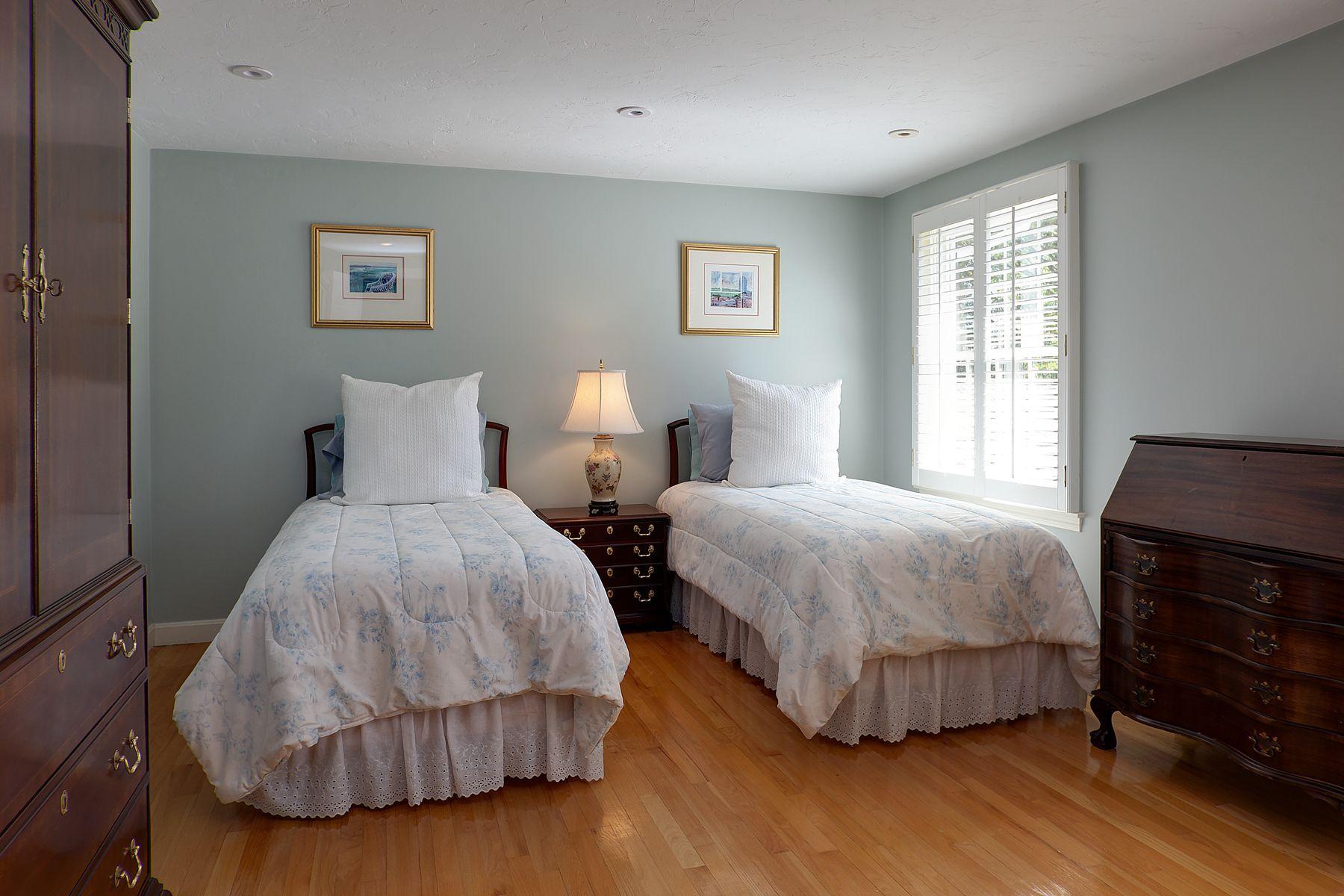 289 East Bay Road Osterville, MA 02655 - Photo 22 of 30 a bedroom with a bed and wooden floor