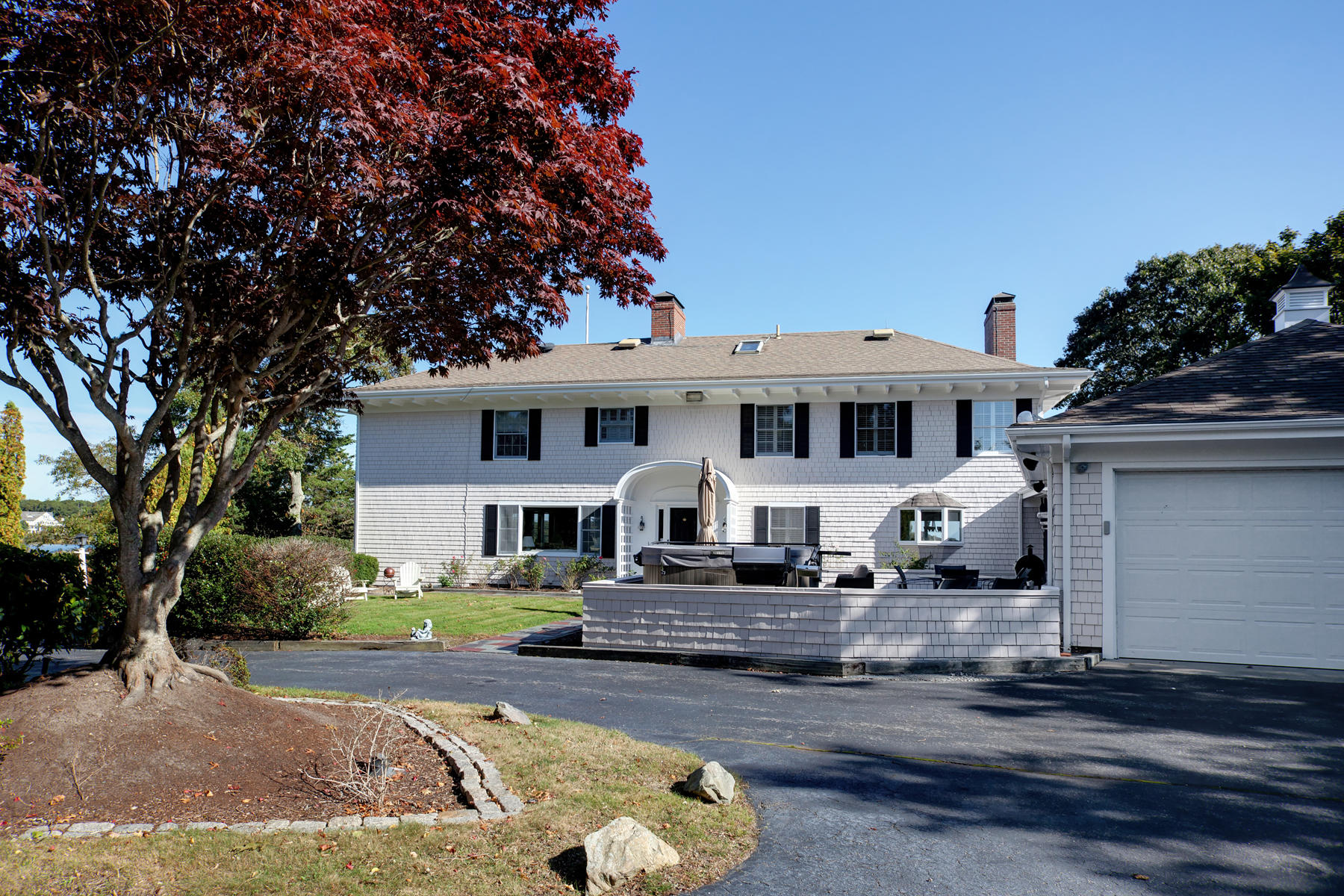 289 East Bay Road Osterville, MA 02655 - Photo 23 of 30 a front view of a house with garden