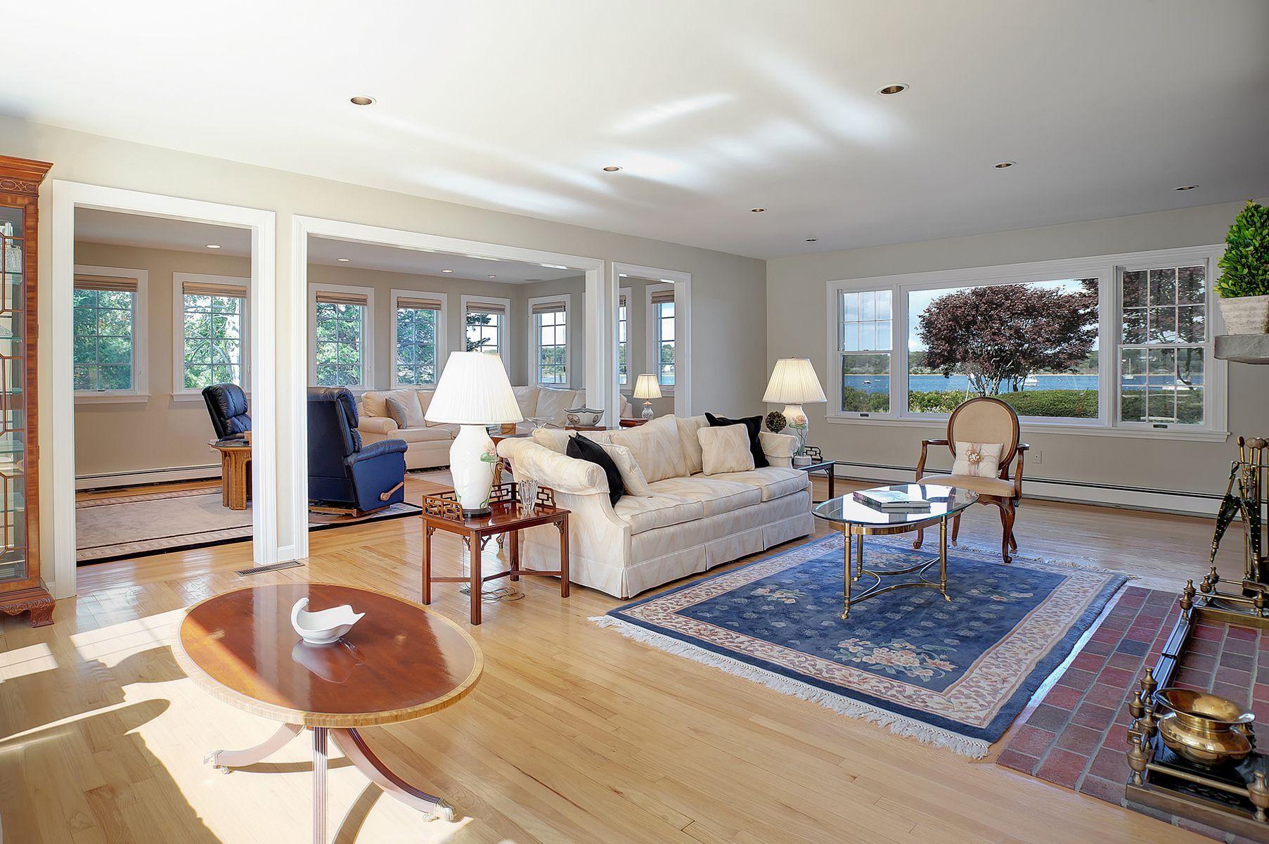 289 East Bay Road Osterville, MA 02655 - Photo 9 of 30 a living room with furniture and a rug