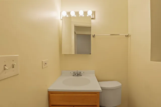 a bathroom with a sink and a toilet