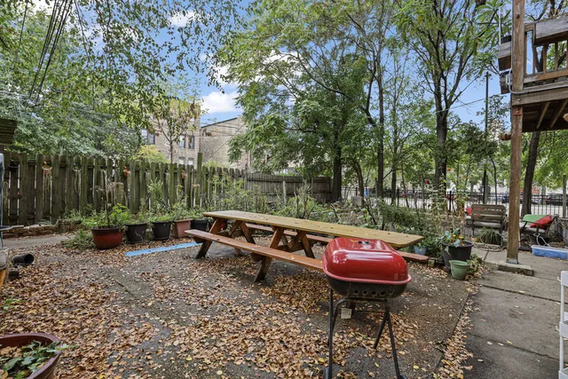 a view of an outdoor sitting area with fire pit