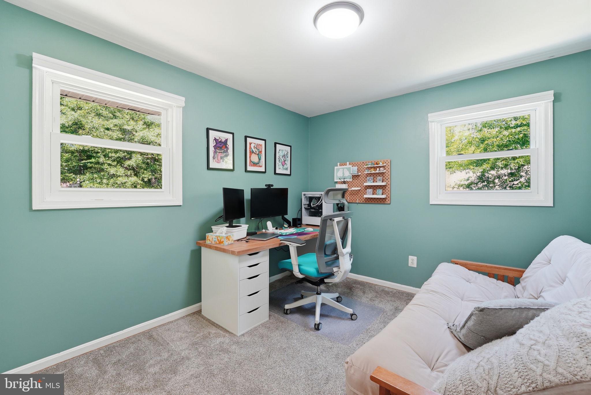 9205 Ivanhoe Road Fort Washington, MD 20744 - Photo 13 of 21 Serene workspace with vibrant walls.