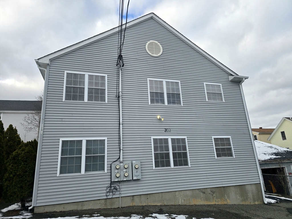303 Eagle Street, Unit C Fall River, MA 02721 - Photo 26 of 32 a front view of a house
