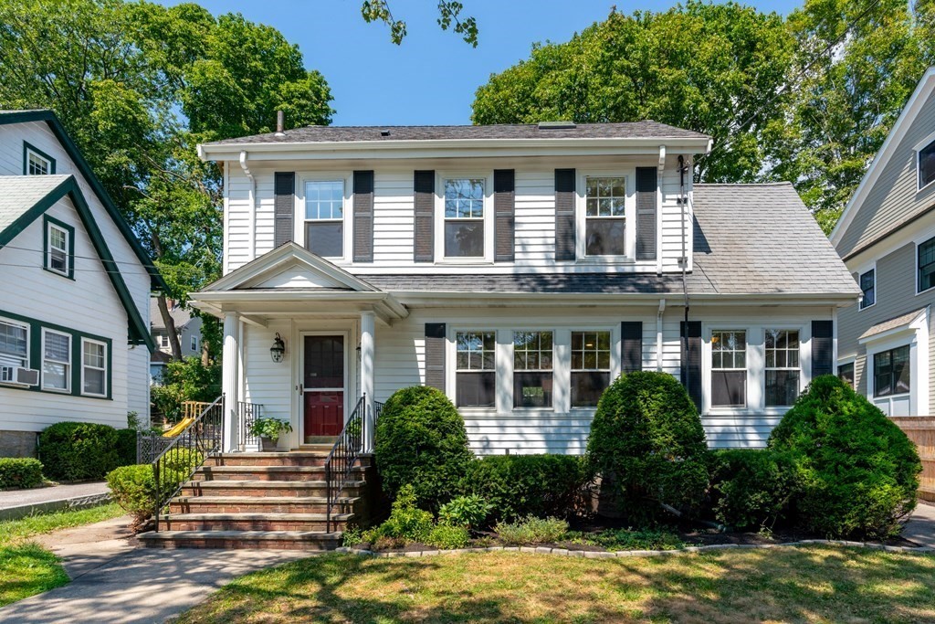 52 Arborough Road Boston, MA 02131 - Photo 1 of 35 a front view of a house with a garden