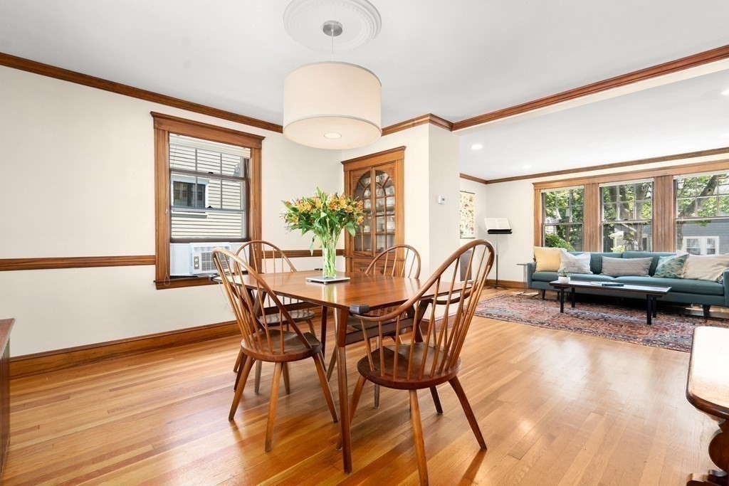 52 Arborough Road Boston, MA 02131 - Photo 19 of 35 a view of a dining room with furniture window and wooden floor