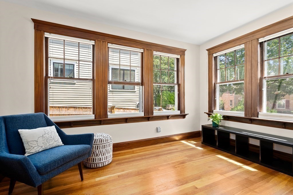 52 Arborough Road Boston, MA 02131 - Photo 24 of 35 a living room with furniture and a window