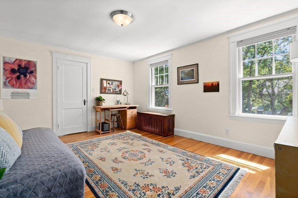 52 Arborough Road Boston, MA 02131 - Photo 25 of 35 a living room with furniture window and flat screen tv