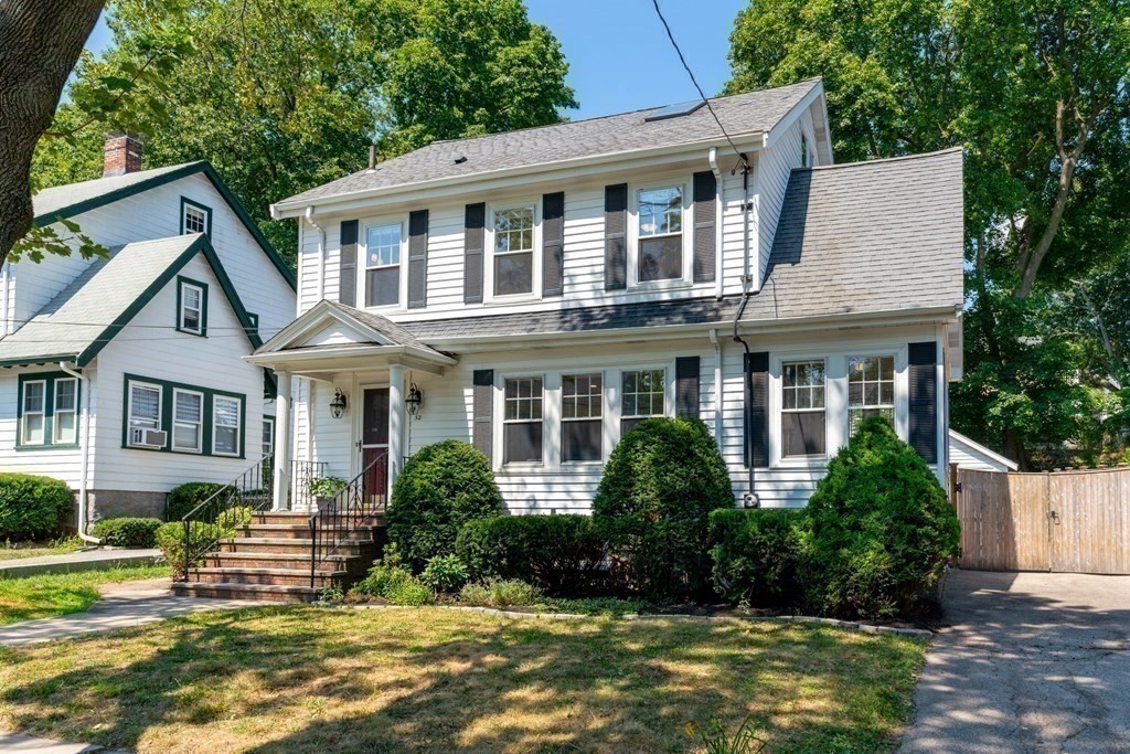 52 Arborough Road Boston, MA 02131 - Photo 33 of 35 a front view of a house with a yard
