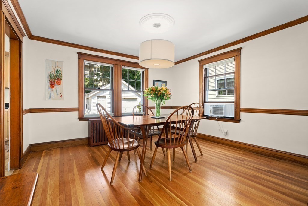 52 Arborough Road Boston, MA 02131 - Photo 5 of 35 a view of a dining room with furniture window and wooden floor