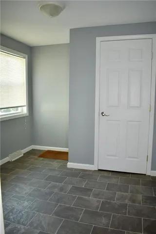 an empty room with window