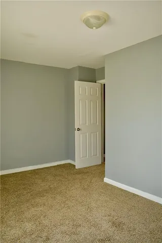 an empty room with an entryway