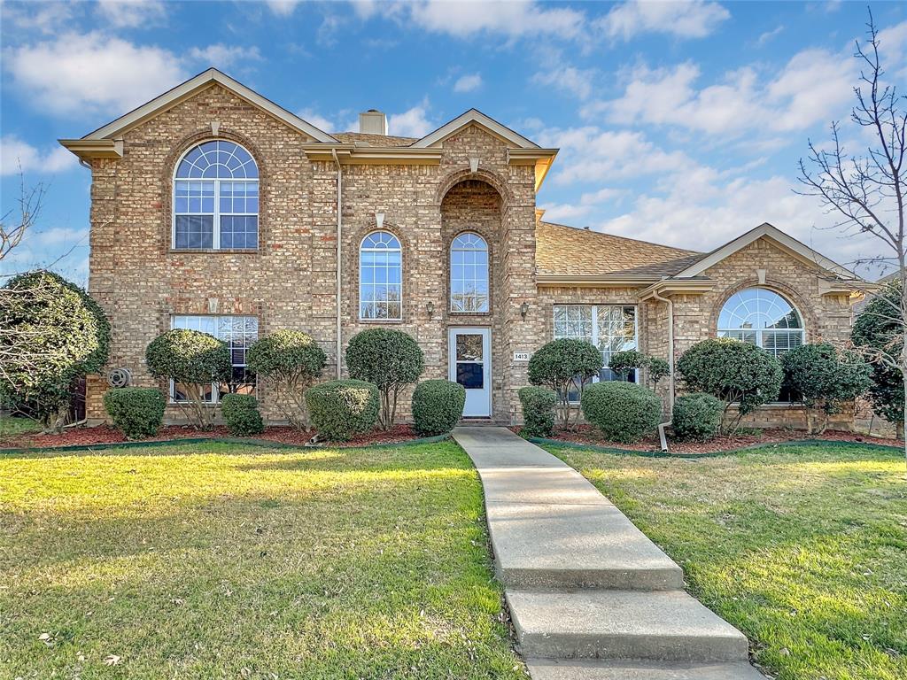a front view of a house with swimming pool having outdoor seating