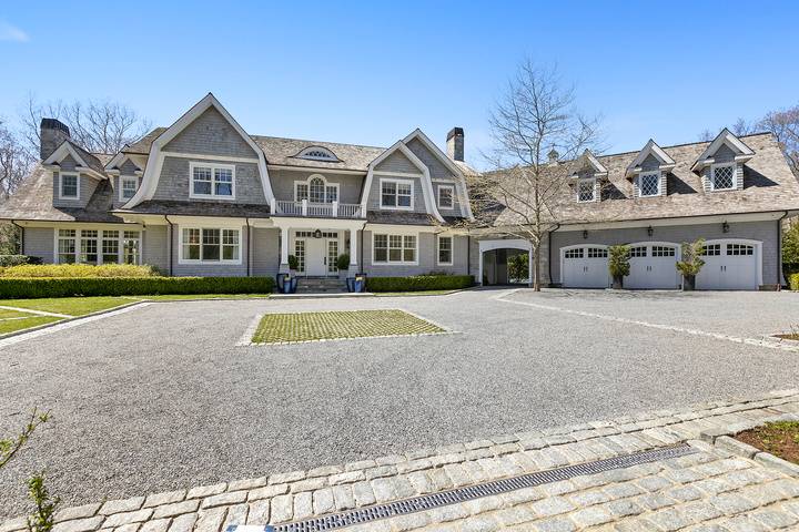 496 Wainscott Harbor Road Sagaponack, NY 11962 - Photo 2 of 20 a view of multiple houses with a street