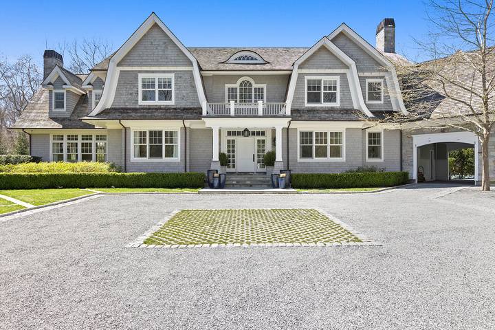 496 Wainscott Harbor Road Sagaponack, NY 11962 - Photo 19 of 20 a front view of a house with yard