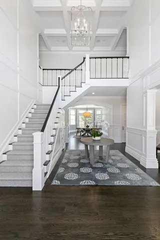 a view of hall way with furniture