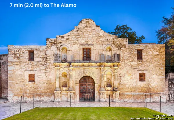 a view of a building with a swimming pool