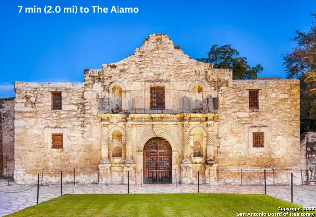 a view of a building with a swimming pool