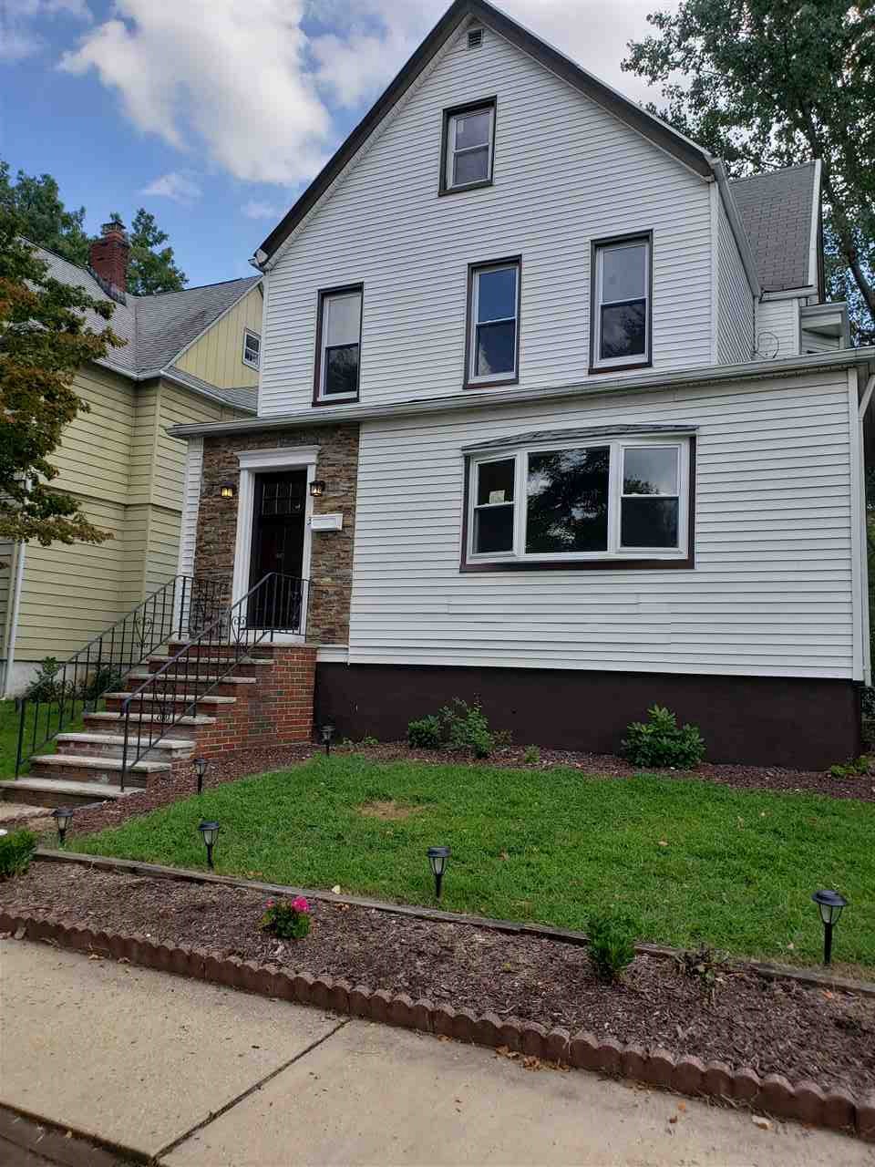 3 7th Street Ridgefield Park, NJ 07660 - Photo 1 of 1 a front view of a house with a yard