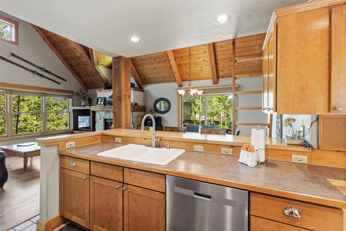 12 Big Boulder Court, Unit 13 Keystone, CO 80435 - Photo 13 of 35 a kitchen with a sink and a large window