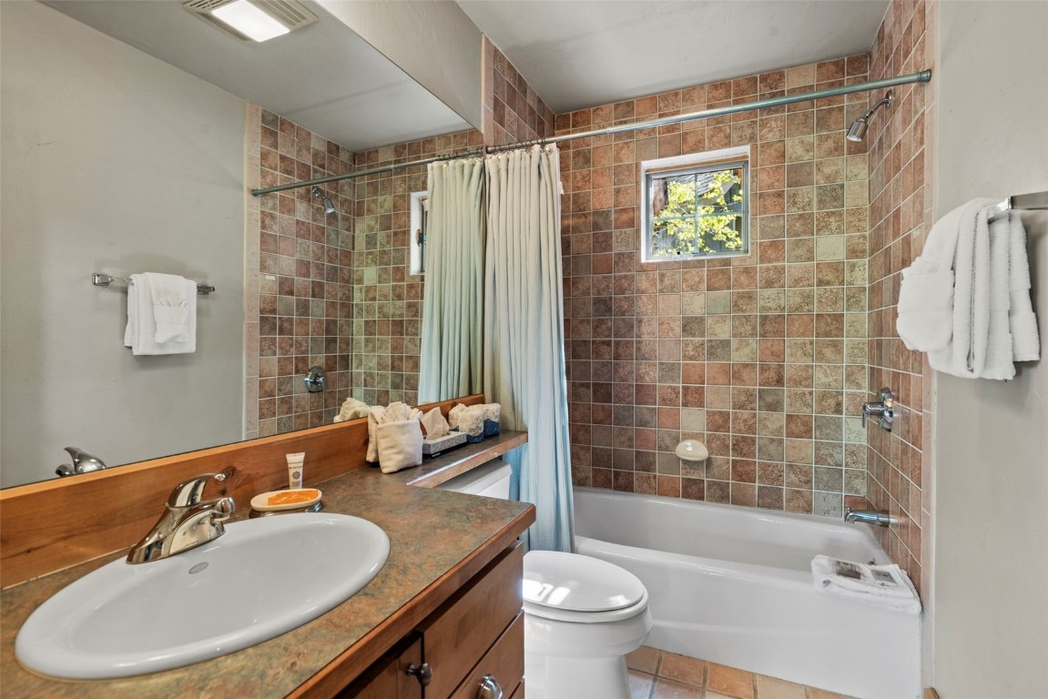 12 Big Boulder Court, Unit 13 Keystone, CO 80435 - Photo 21 of 35 a bathroom with a sink toilet and shower